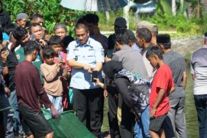 Panen Perdana 6 Ton Ikan Nila, Bupati Irwan Apresiasi Keberhasilan BUMDes Mabonta